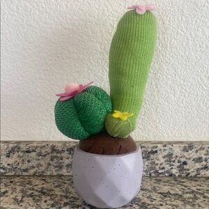 Green and White Knitted Cactus Decor with Pink Flower